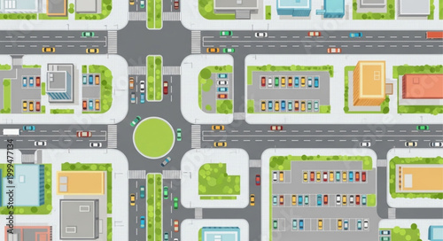 Aerial view of a busy city intersection with buildings and traffic.