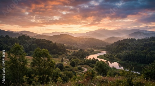 Sunset over a serene river winding through a lush landscape with trees and mountains