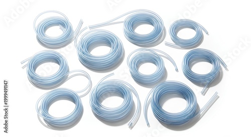 Coiled blue tubes on white background for medical or industrial use