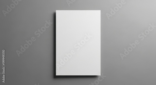 Blank white vertical flyer or magazine cover mockup on a solid gray background