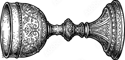 Ornate metal goblet lying horizontally with detailed engravings