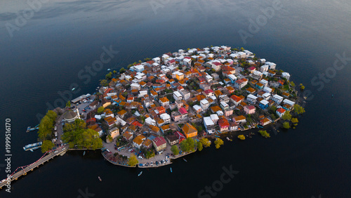 An island city surrounded by lake waters.