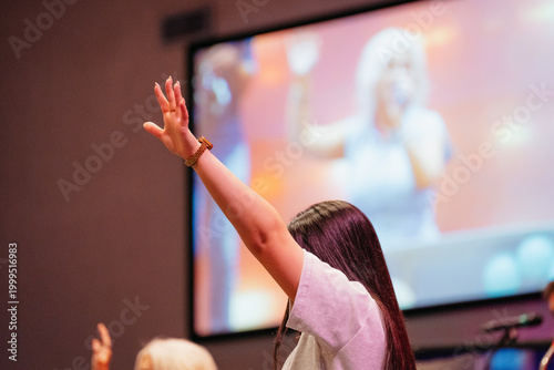 Worship leader worshiping, church