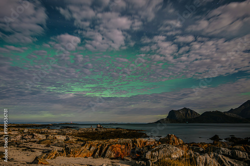 Northern lights on sky at Lofoten islands