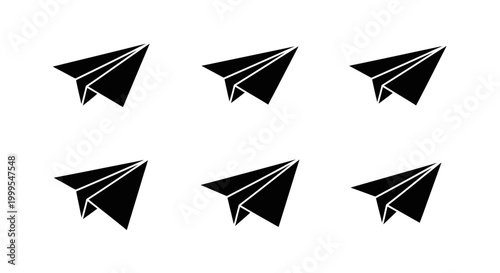 Six Black Paper Airplanes Flying in Formation on White Background
