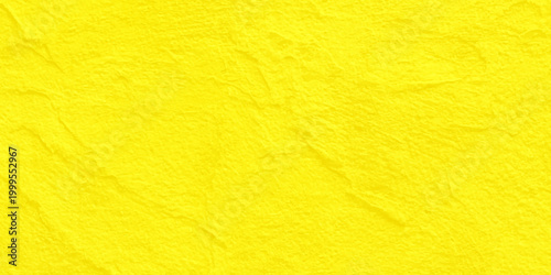 vibrant yellow textured paper background with rough fiber detail for creative graphic design and minimal backdrop. lemon-yellow paper texture with visible organic fibers and a subtle granular finish. 