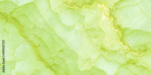 Pale green onyx marble texture background, translucent jade stone luxury mineral surface. crystalline formations, and subtle golden-yellow mineral veining. 