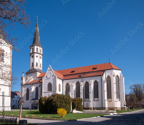 St James Basilica, a Gothic church in Levoca, Slovakia, under clear blue sky. Historic architecture and cultural landmark in Central Europe.
