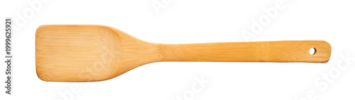 Foto Levitating wooden cooking spatula turner isolated on a pastel white background