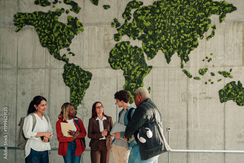 Foto Group of diverse students smiling and discussing in front of a concrete wall wit