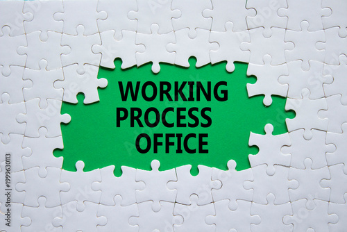 Working Process Office symbol. White puzzle with words Working Process Office. Beautiful green background. Business concept. Copy space.