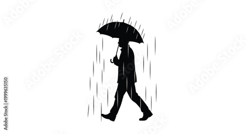 Silhouette of a man with umbrella walking in the rain