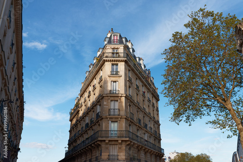 Photos The facade of typical Parisian buildings, done in the typical elegant Haussmann or Haussmannian 19th-century style