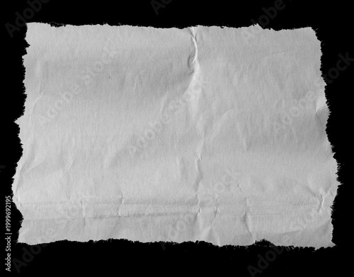 Torn paper on black