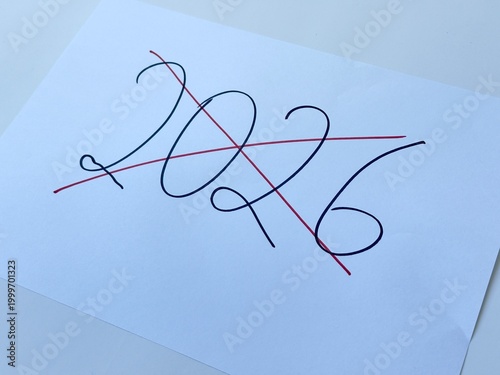 Canvas Print Handwritten 2026 crossed out with red line on white paper