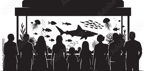 Silhouettes of visitors at an aquarium watching sharks with day out