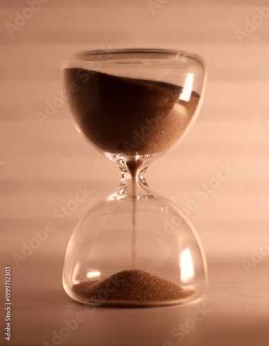 Hourglass as symbol of passing time concept photo vertical orientation art 
