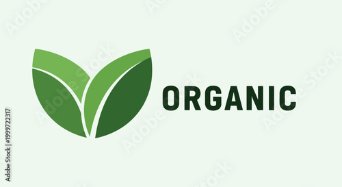 A close-up view of organic leaves on a light green background with the word ORGANIC.