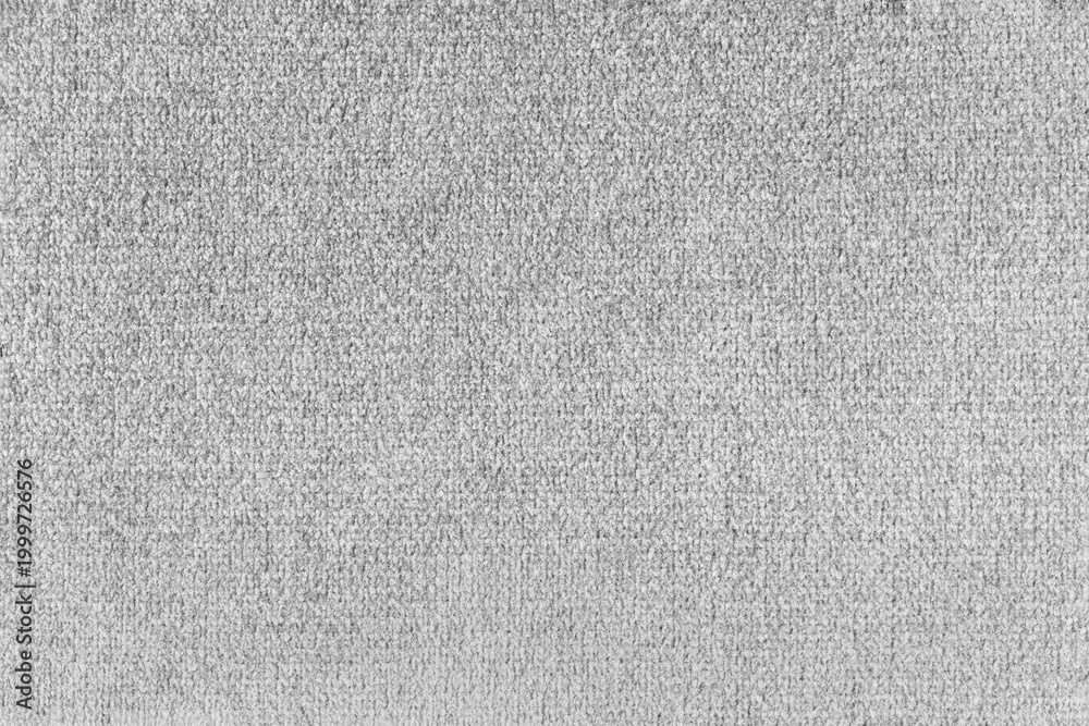 Fototapeta premium Close up, macro of white fabric texture with soft velvet, fluffy woven surface, rich textile detail. Knitted jersey cloth background, backdrop, wallpaper for design, fashion or interior projects