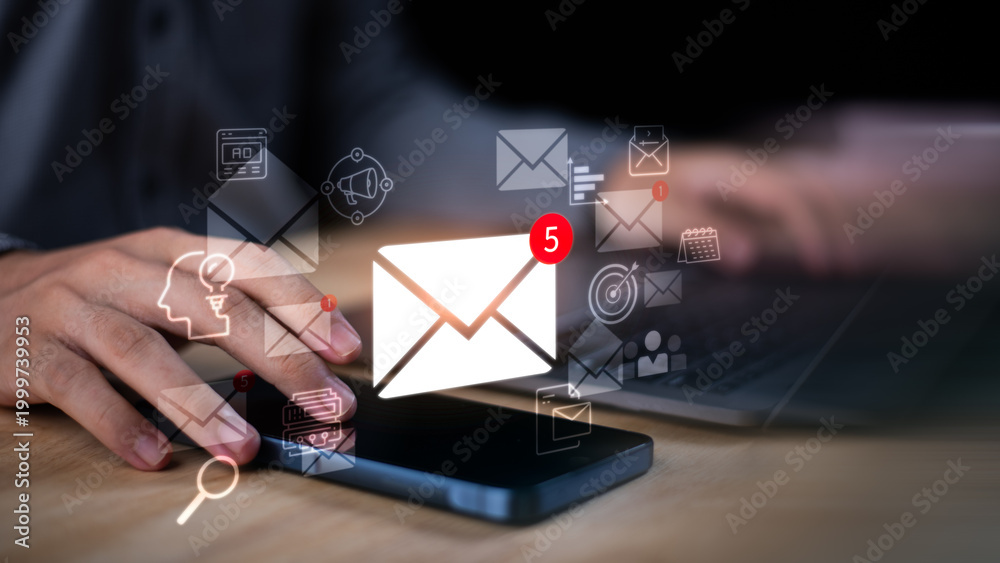 Fotografie Digital marketer executes email campaign strategy using automation platform, ana