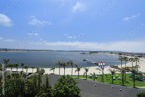 Sandy beach around Sail Bay and Santa Clara Point with yachts and boats waiting for summer sports fun in San Diego recreational neighborhood 