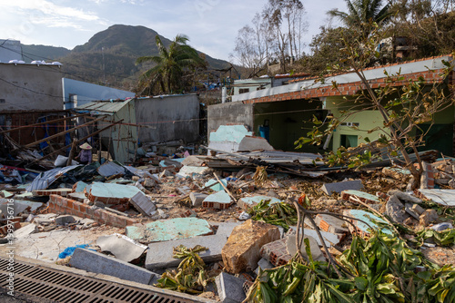 Bild auf Leinwand Extensive damage to herahome and neighborhood after a devastating storm in Nhon Hai, Quy Nhon, Binh Dinh, Vietnam