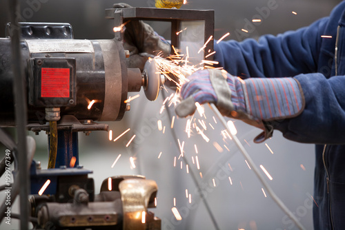labor working grinding metal wire