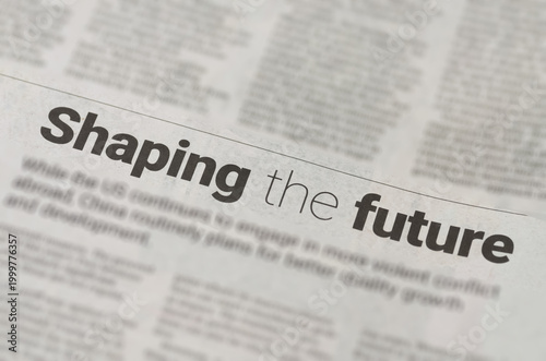Shaping the Future Text Headline in Newspaper