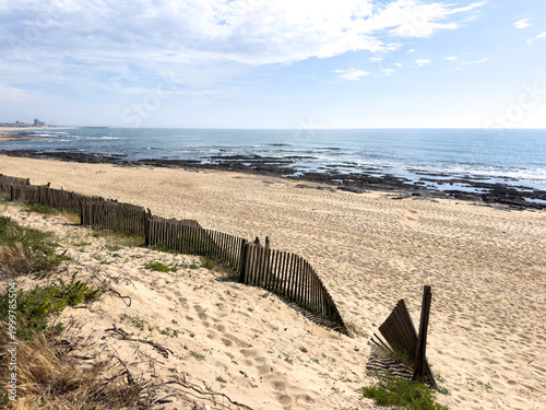 Scenic View of Praia da Granja Beach with Sand Dunes and Wooden Fencing in Porto Portugal