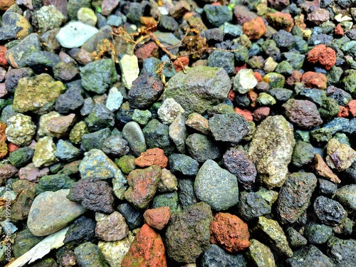 Fotografie Abstract Background of Small Natural Stones and Pebbles