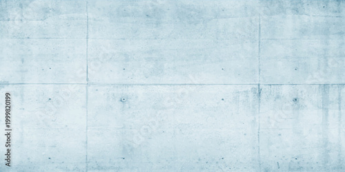 Old blue painted wall with a rough grunge texture and aged paper pattern creates a vintage light blue canvas backdrop for design