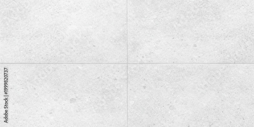 A blank gray concrete wall texture with a rough stone pattern and grunge cement surface creates an old textured backdrop for vintage design