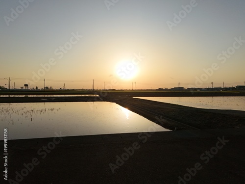 Sunset glows over tranquil water pools