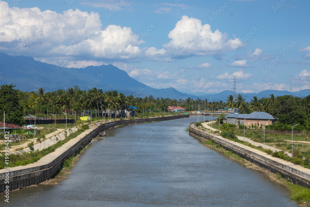 Fototapeta premium River Canal Through Tropical Landscape