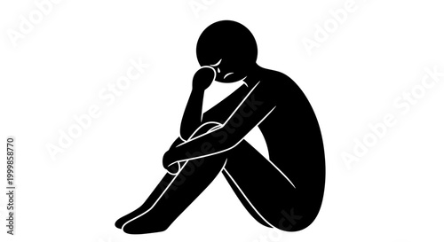 Silhouette of a person sitting alone head bowed hand covering face conveying deep sadness despair loneliness and mental