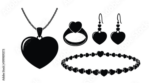 Black heart shaped jewelry collection displayed as a striking silhouette