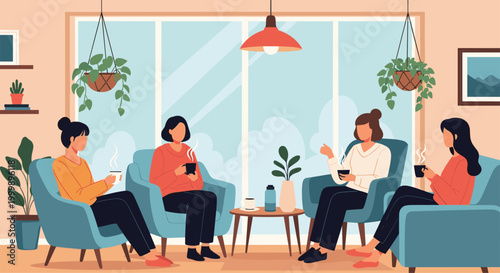 Group of four women sitting in comfortable armchairs and having a conversation over coffee in a bright modern room.