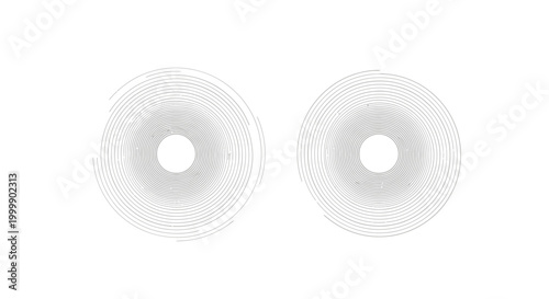 Two white plastic washers side by side.