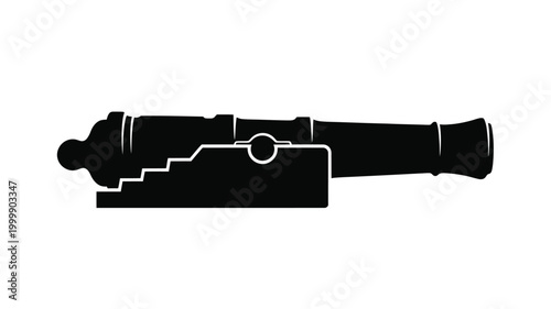 Antique cannon depicted in a striking black silhouette