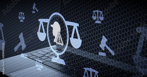 Digital law and justice concept with legal icons gavel and scales on a computer keyboard background representing cyber crime warning and legal issues or courtroom security