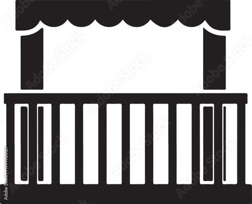 Black and white of a balcony with a scalloped awning and vertical railing posts