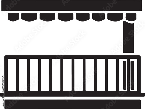Black and white of a balcony with a scalloped awning and vertical railing