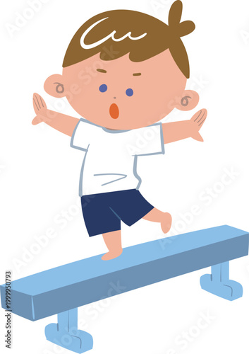 体操服で平均台の上を歩く男の子