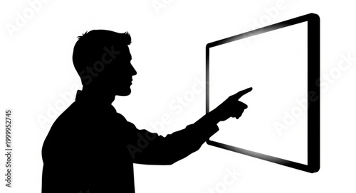 Silhouette of a man interacting with a large touchscreen display.