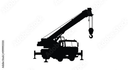 Mobile crane silhouette against a white background