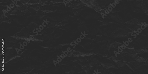 Black paper background with halftone dot crumpled texture. Noisy craft effect