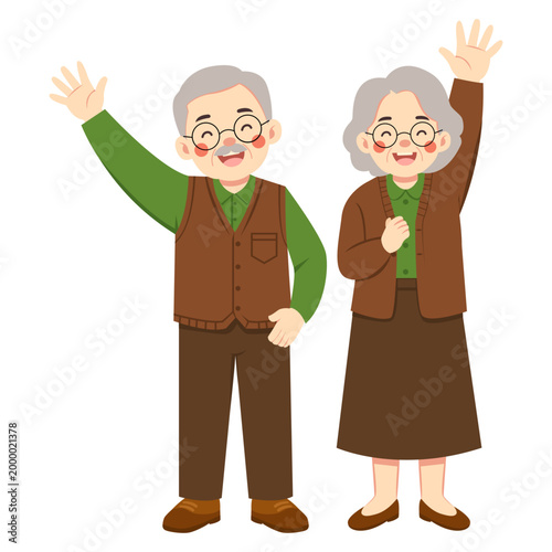 Elderly Couple Waving Hands Happily While Standing Together And Greeting With Friendly Expression