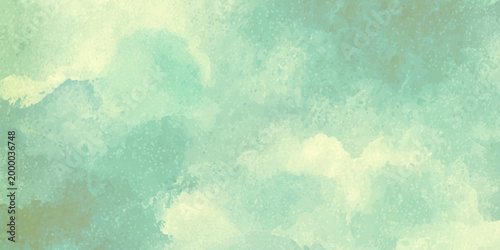 Soft green and beige watercolor texture background with abstract cloudy shapes and subtle gradient effect for design and artistic use