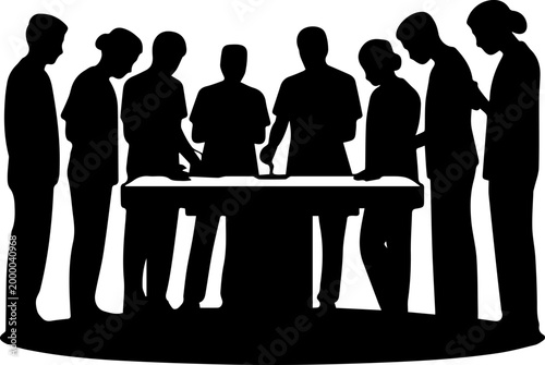 Silhouette of a Diverse Group of People Working Together and Collaborating Around a Table