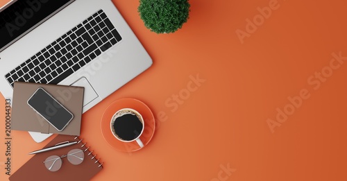 Modern Workspace with Laptop, Smartphone, Coffee, and Notebooks on Orange Desk for Creative Productivity